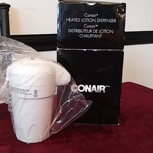 Heated lotion dispenser